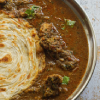 Malabar Parotta With Mutton Curry